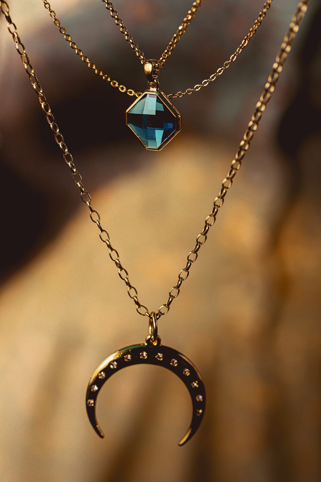 Gold chain necklace and rings