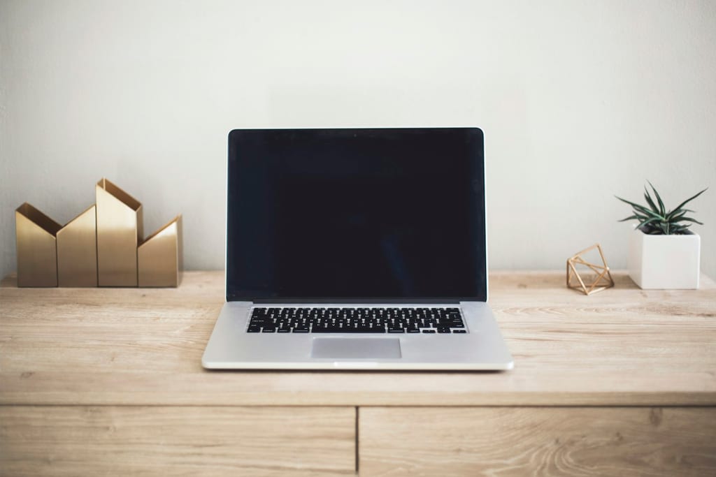 Open laptop on a clean desk